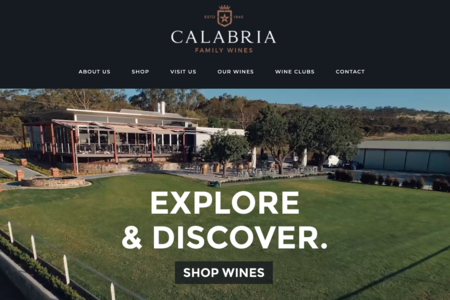 screenshot of Calabria website photo of winery with words Explore & Discover.